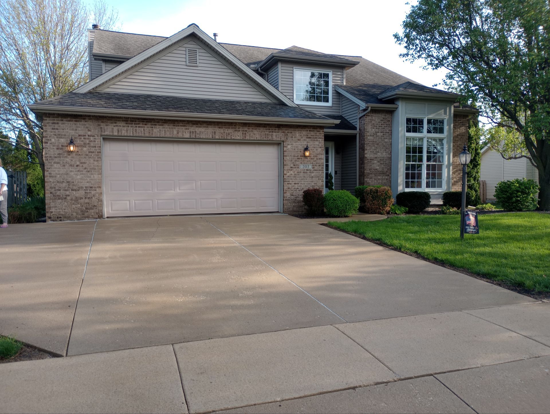 Clean residential driveway and home exterior in Central Illinois