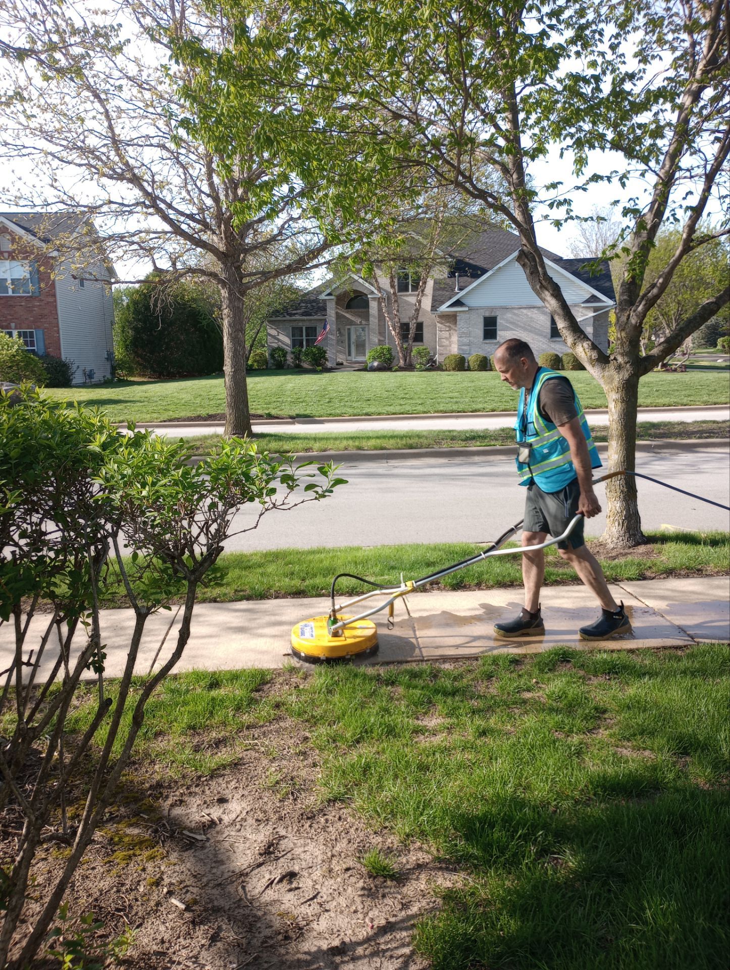 Pressure washing job photo showing exterior cleaning work